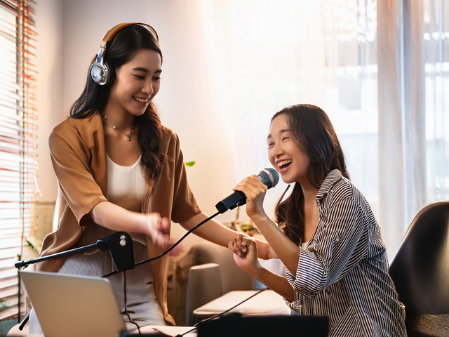 Musicians collaborating on a song