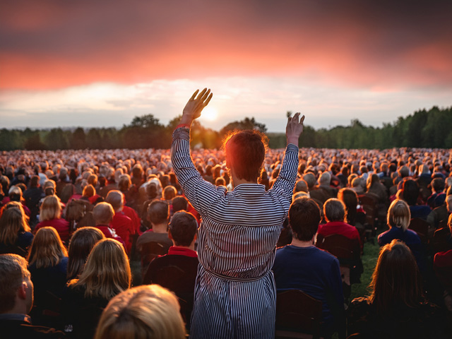 Group enjoying music and poetry